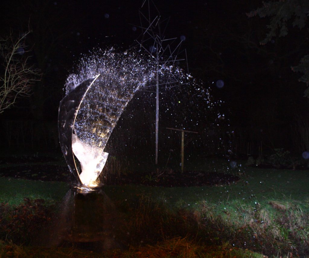 Fountain - stainless steel at night